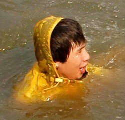 swimming in a long cagoule
